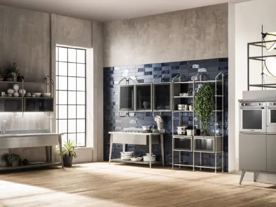 Cucina Moderna Diesel Open Workshop con top in Corian e finiture Acciaio Soft di Scavolini